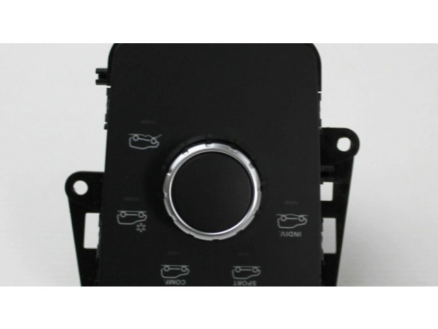 Включатель регулировки высоты / жесткости ходовой части