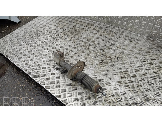 Передний амортизатор