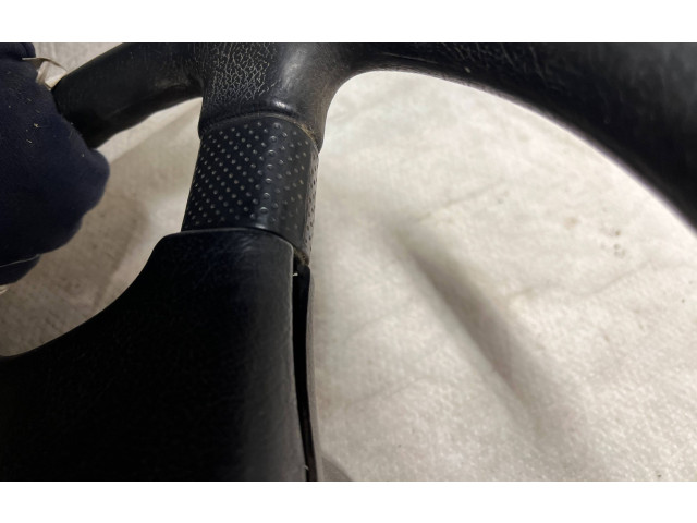 Руль Mitsubishi Colt 1989 - 1992 года MB564540, 1313