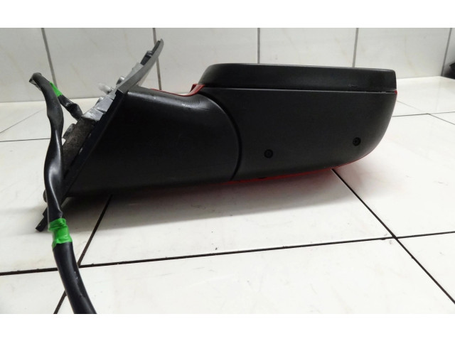 Zpětné zrcátko  Volkswagen Caddy 2010    