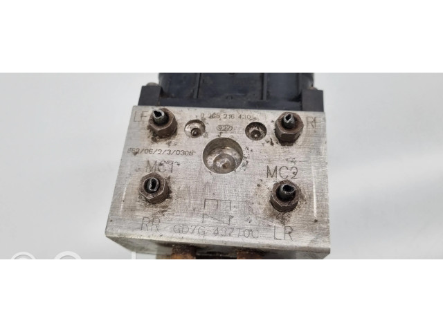Блок АБС GD7G437T0C, 0265216430 Mazda 626 1998-2002 года
