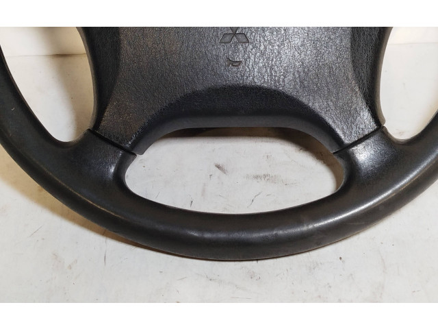 Руль Mitsubishi Carisma 1996 - 1999 года MR740922, 570217300
