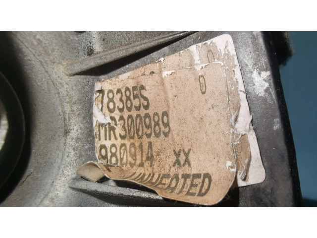 Зеркало (механическое) левое Mitsubishi Carisma 1996-1999 года