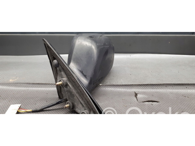 Зеркало электрическое левое Daihatsu Charade 1994-2000 года