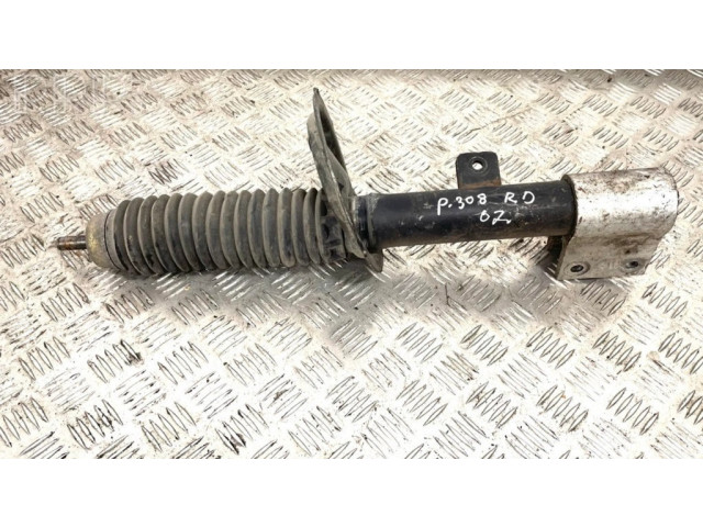 Передний амортизатор