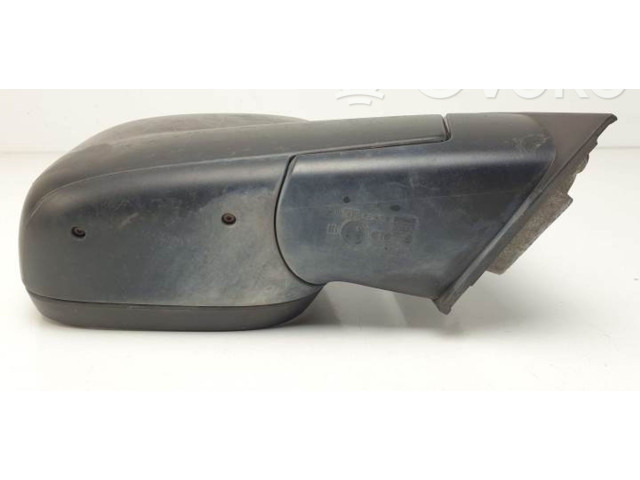 Zpětné zrcátko  Volkswagen Caddy 2010    