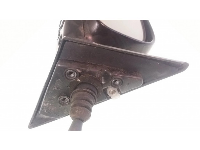 Зеркало (механическое) левое Mitsubishi Colt 1992-1996 года