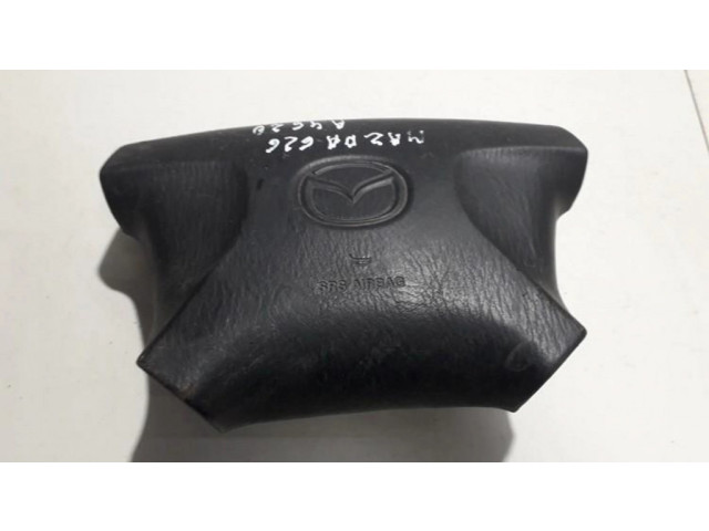 Подушка безопасности водителя ge4t57k00 Mazda 626