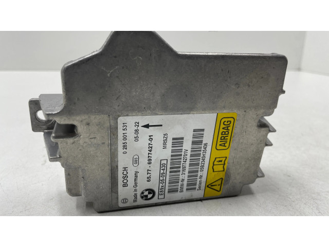 Turbodmychadlo Блок управления надувных подушек 6977427, 31697742701V   BMW 1 E81 E87 2.0  M47