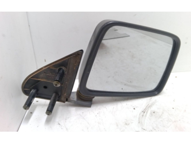 Zpětné zrcátko  Nissan PickUp 2001    