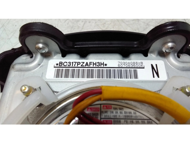 Подушка безопасности водителя 7030A088XB, 607063500K Mitsubishi Outlander