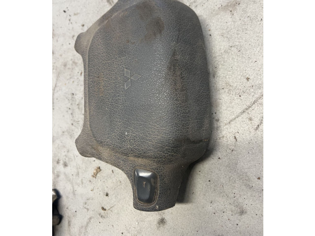 Подушка безопасности водителя BBAGZ83ZAPC, 047002606 Mitsubishi Pajero