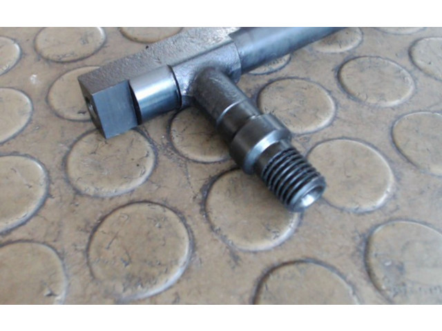 Vstřikovač 73905D Mazda 323