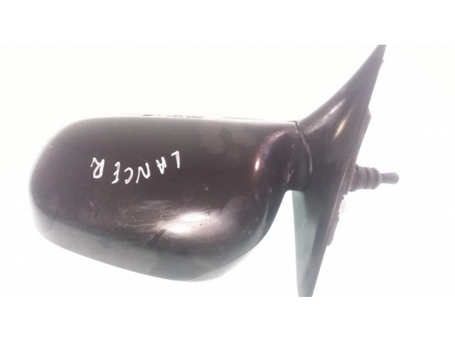 Зеркало (механическое) левое Mitsubishi Colt 1992-1996 года