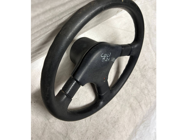 Руль Mitsubishi Colt 1989 - 1992 года MB564540, 1313