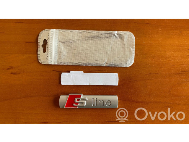 Значок производителя / буквы модели