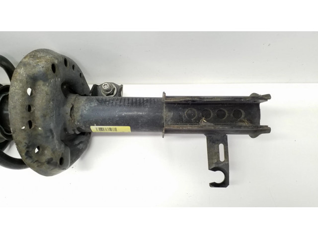 Передний амортизатор с пружиной      