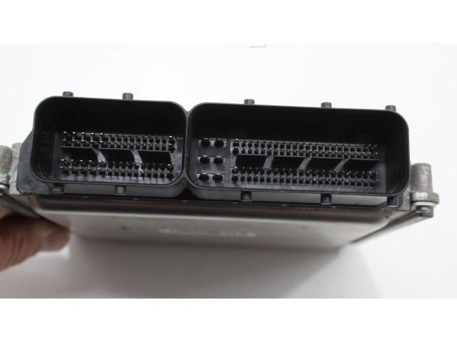 Блок управления двигателя 04b907445 Skoda Rapid (NH)