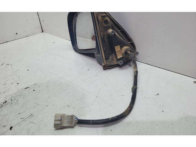 Zpětné zrcátko Ford Maverick 1995