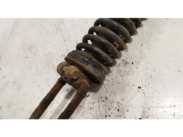 Передний амортизатор с пружиной