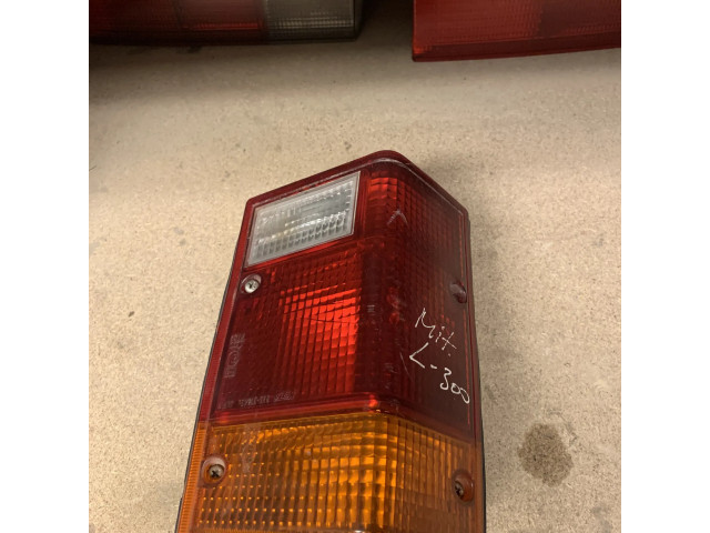Задний фонарь левый сзади 22037445 Mitsubishi L300, Cosmos