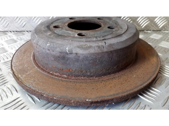 Задний тормозной диск       Dodge Nitro 2.8 55087AL  