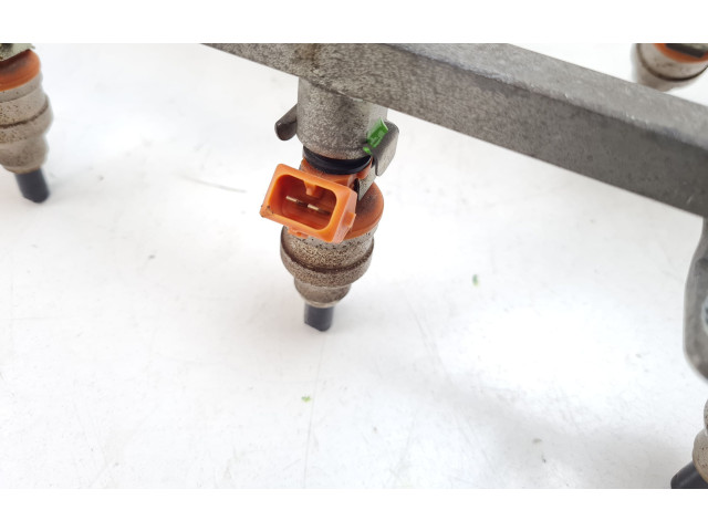 Vstřikovač INP060, BDH182 Chrysler Stratus 6G73