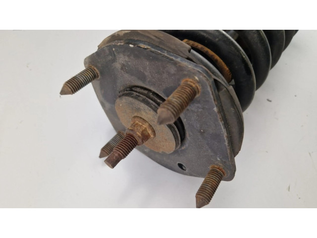 Передний амортизатор