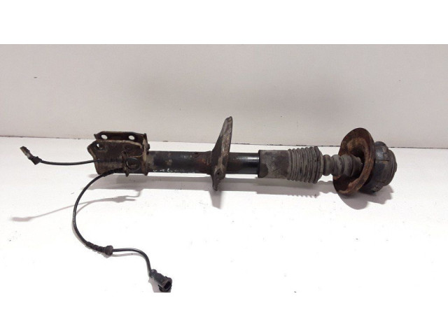 Передний амортизатор