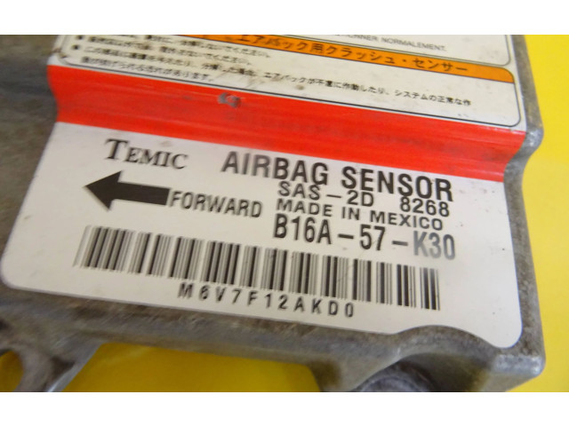 Блок подушек безопасности B16A-57-K30   Mazda 323 F