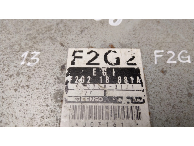 Блок управления двигателя F2G218881A   Mazda 626