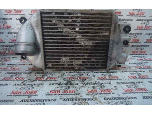 Интеркулер     Subaru Forester SH 