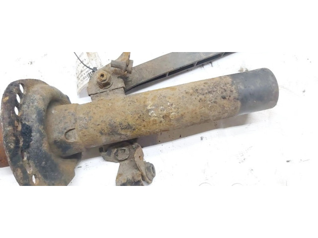 Передний амортизатор