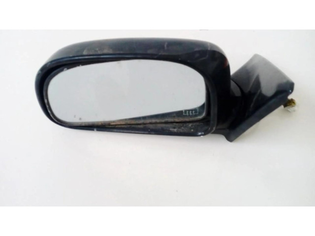Зеркало электрическое левое Mitsubishi Colt 1992-1996 года