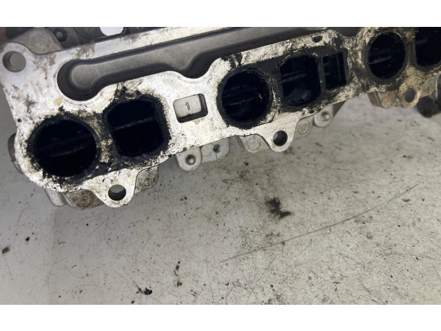 Всасывающий коллектор 00070002811, A6390900637 Mitsubishi Colt