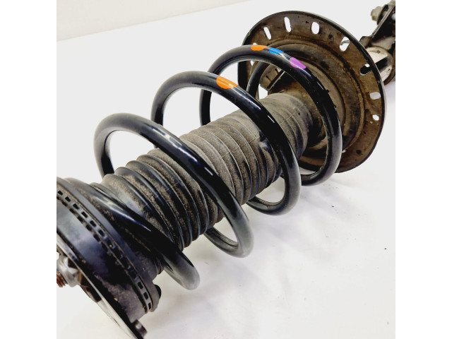 Передний амортизатор с пружиной      