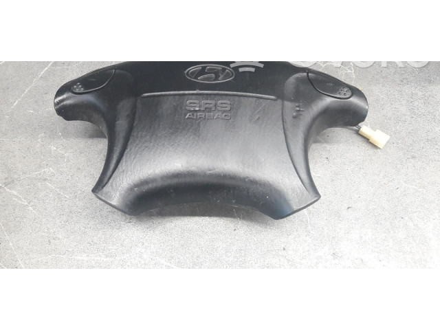 Подушка безопасности водителя    Hyundai Coupe