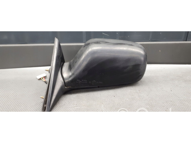 Зеркало электрическое левое Daihatsu Charade 1994-2000 года