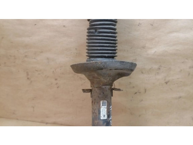 Передний амортизатор