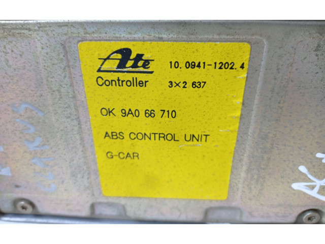 Блок управления АБС OK9A066710   KIA Clarus