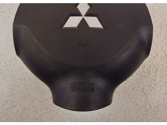 Подушка безопасности водителя 7030A263XA Mitsubishi L200