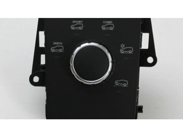 Включатель регулировки высоты / жесткости ходовой части