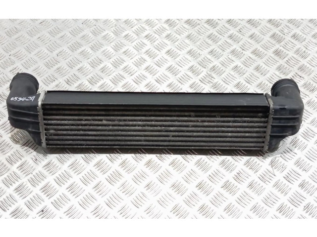 Интеркулер  77897930   BMW X3 E83 