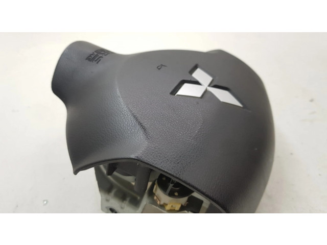 Подушка безопасности водителя 7030A088XA, 607063500A Mitsubishi Outlander