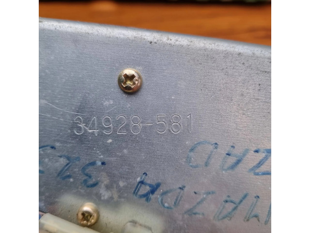 Моторчик заднего дворника 34928581 Mazda 323 F