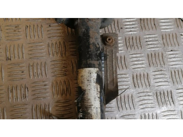 Передний амортизатор