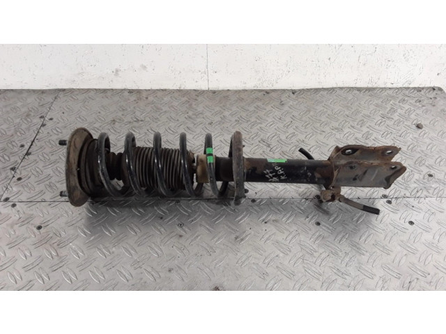 Передний амортизатор