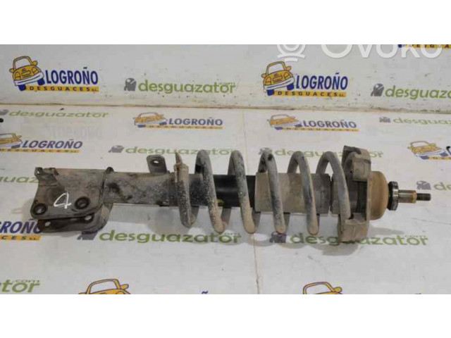 Передний амортизатор с пружиной      