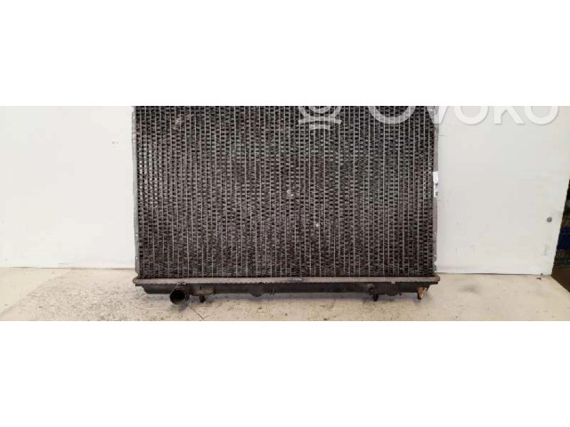 Радиатор охлаждающей жидкости Mitsubishi Carisma 2000 - 2004 года