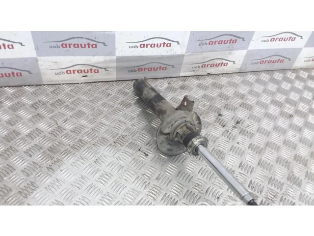 Передний амортизатор